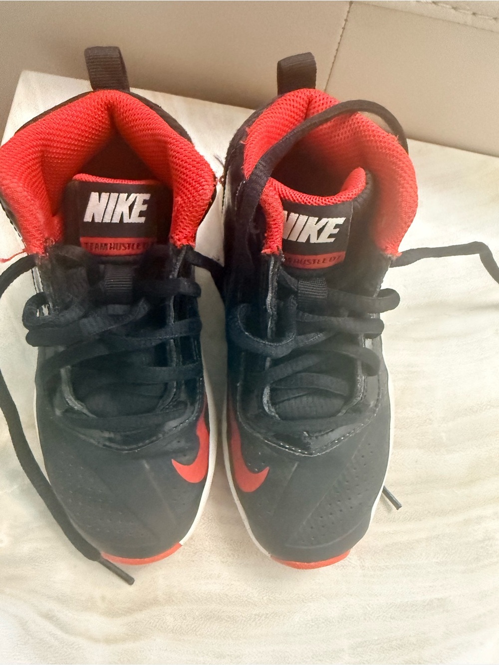 Nike Kids Black Sneakers with Red Accents